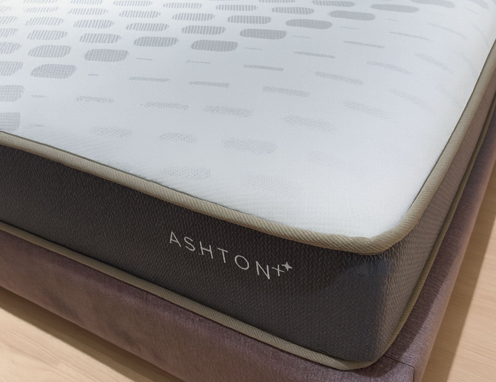 Aston Plus mattress displayed on a contemporary bed base