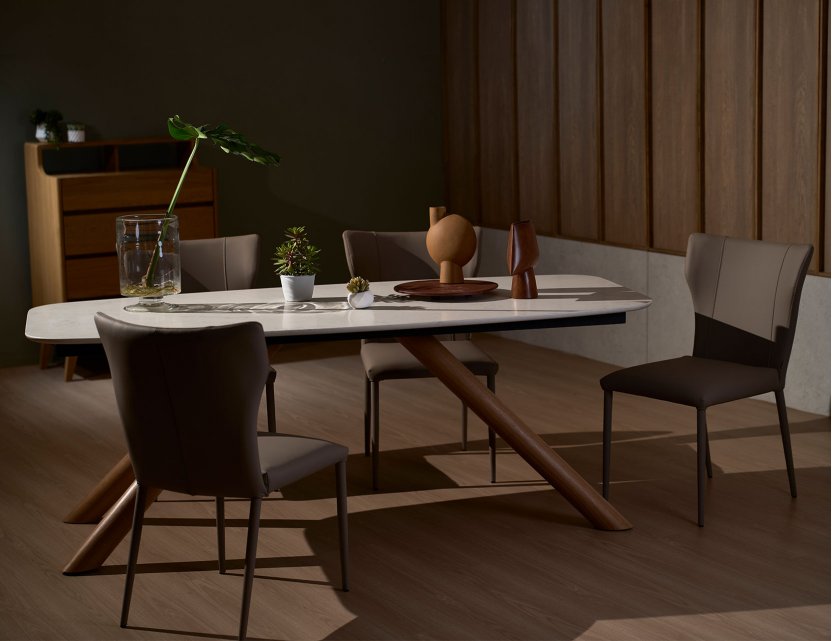 Branca quartz dining table with foil dining chairs