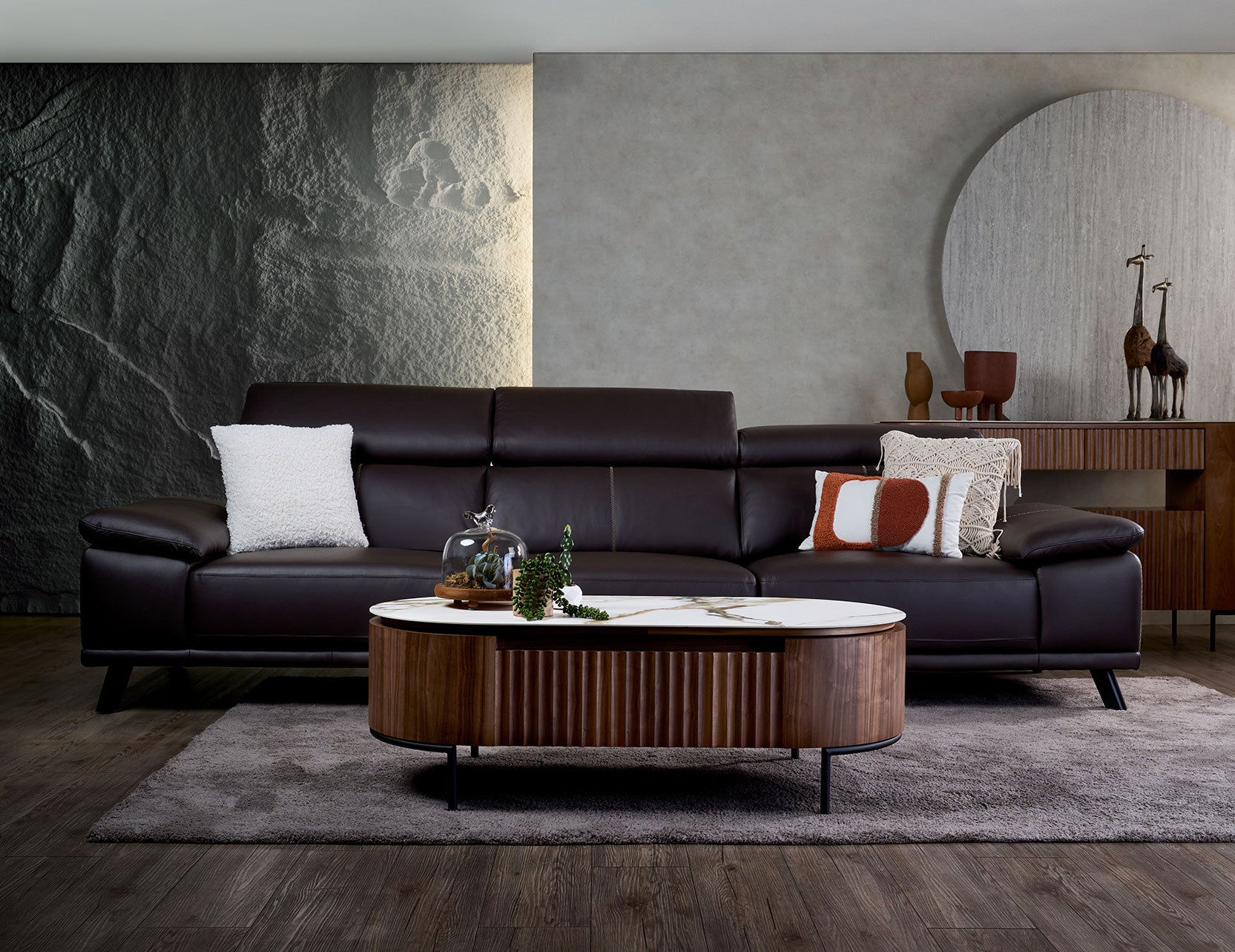 Kof leather sofa front view with a refined profile