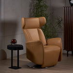 Wingback chair paired with stem table and storage rack