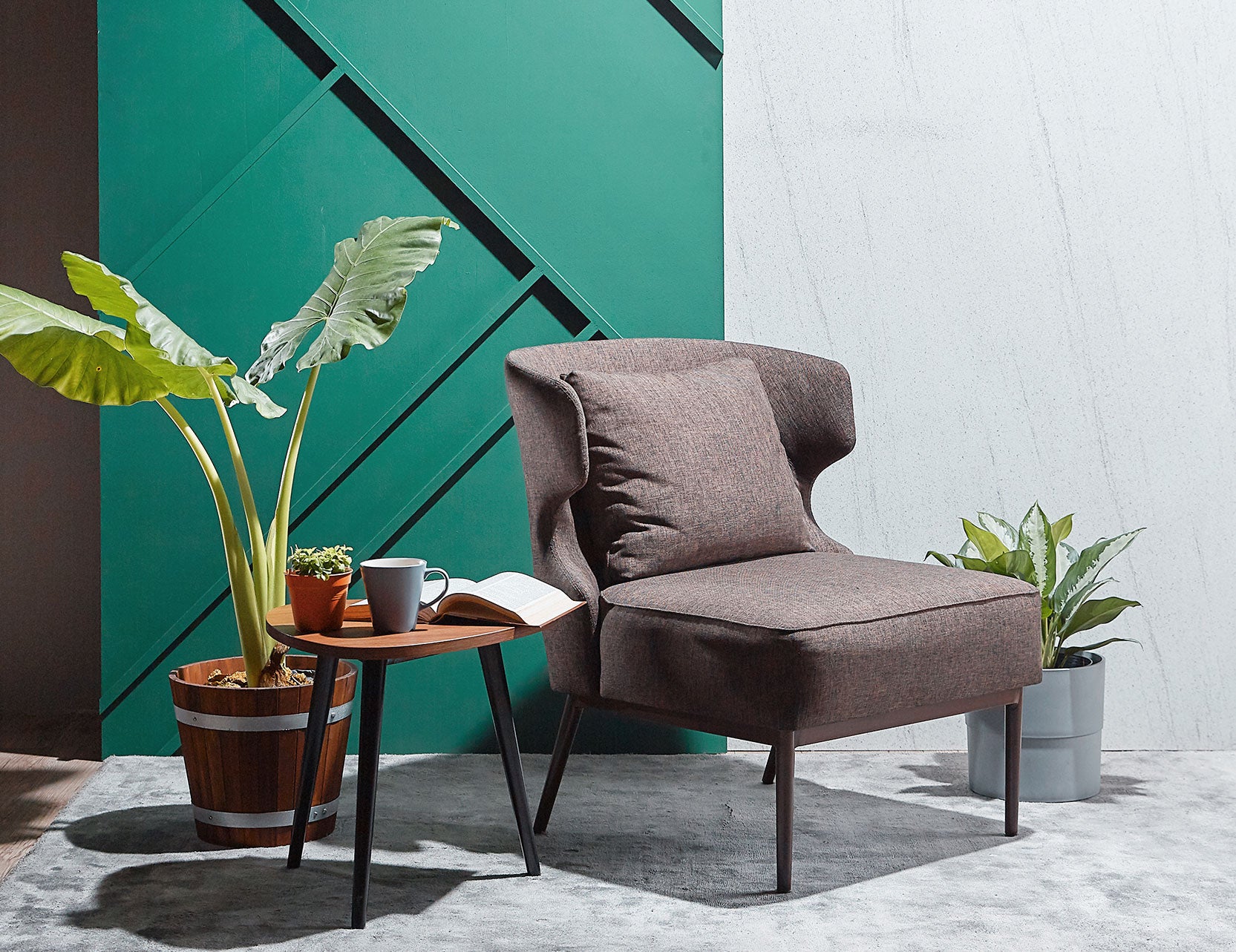 Wing fabric armchair with a bold sculptural form