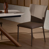 Foil leather dining chair featuring a sleek contemporary form