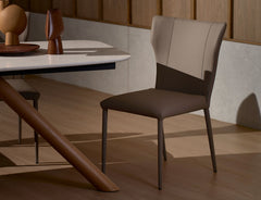 Foil leather dining chair featuring a sleek contemporary form