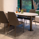 Capsule dining table paired with Henry chairs