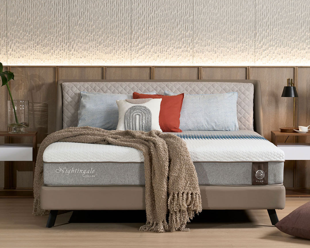 Slanted bed frame styled in a bedroom setting